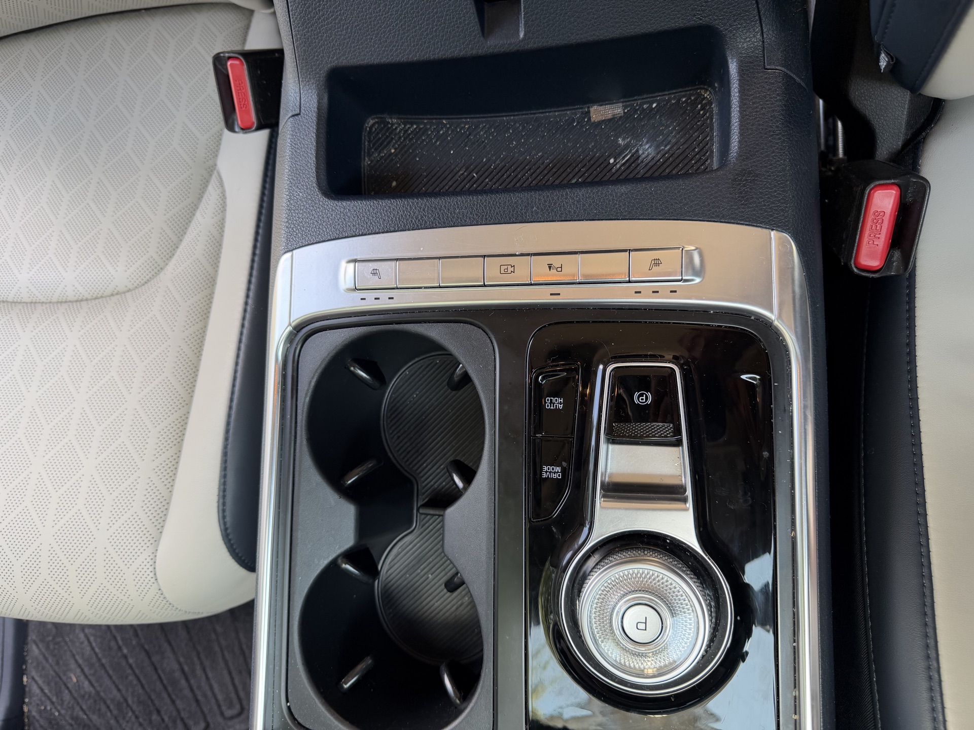 SUV center console before detailing