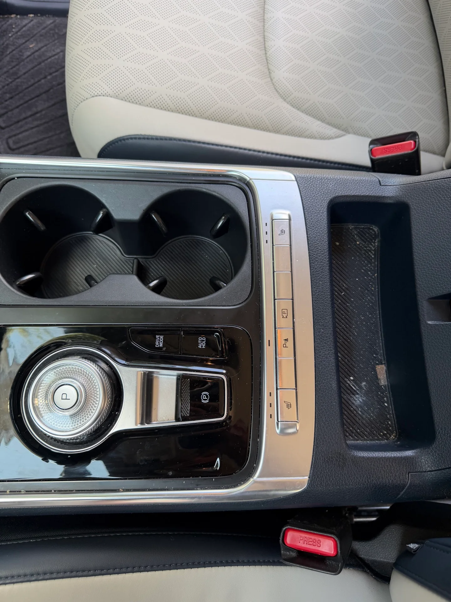 SUV center console before detailing